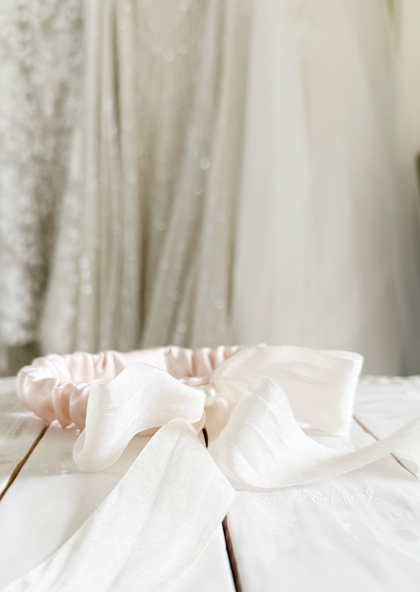Blush Pink Satin Wedding Garter  with hand tied silk bow and pearl center by Big Rock Bridal