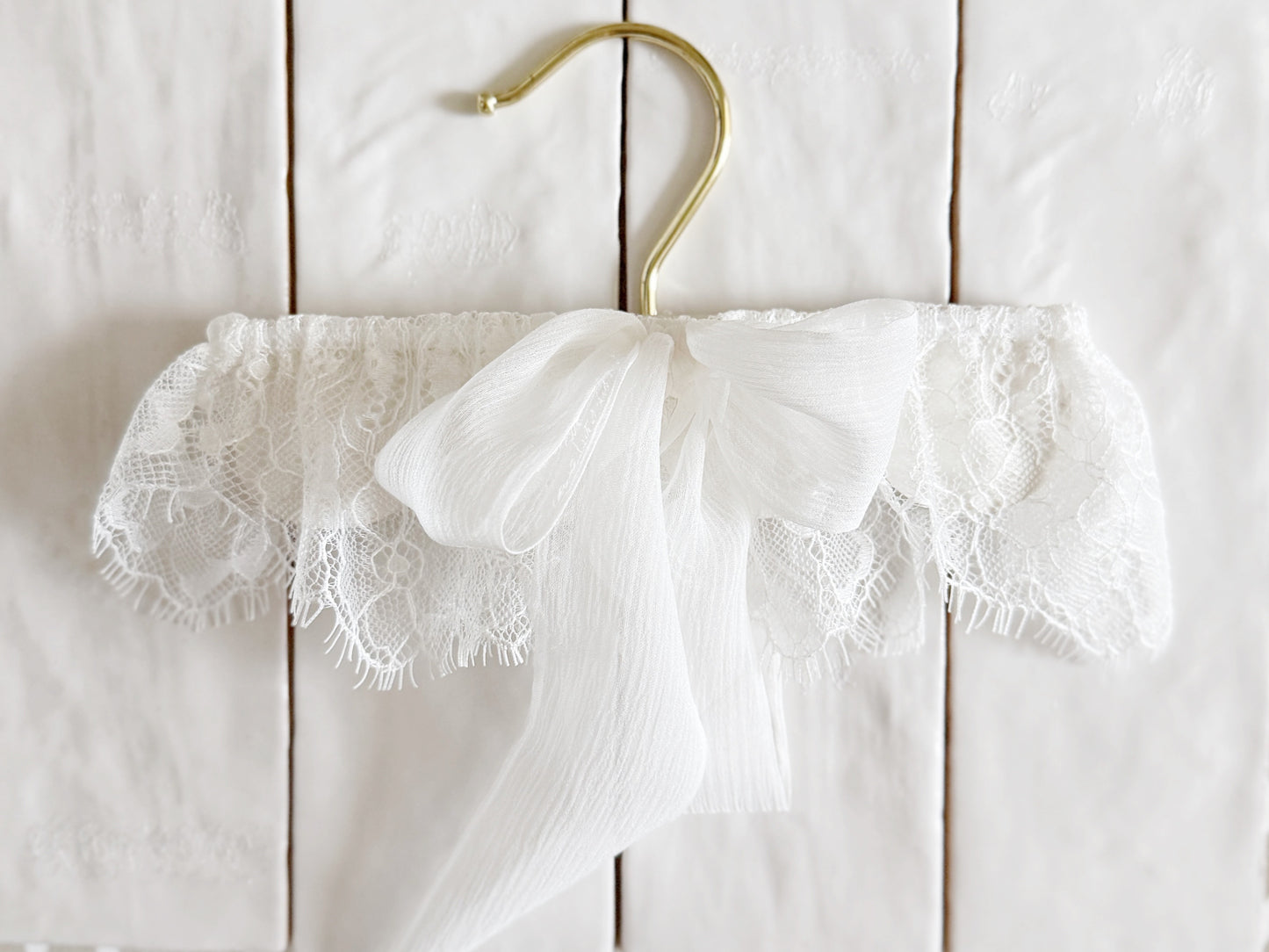 White chantilly lace wedding garter with silk bow