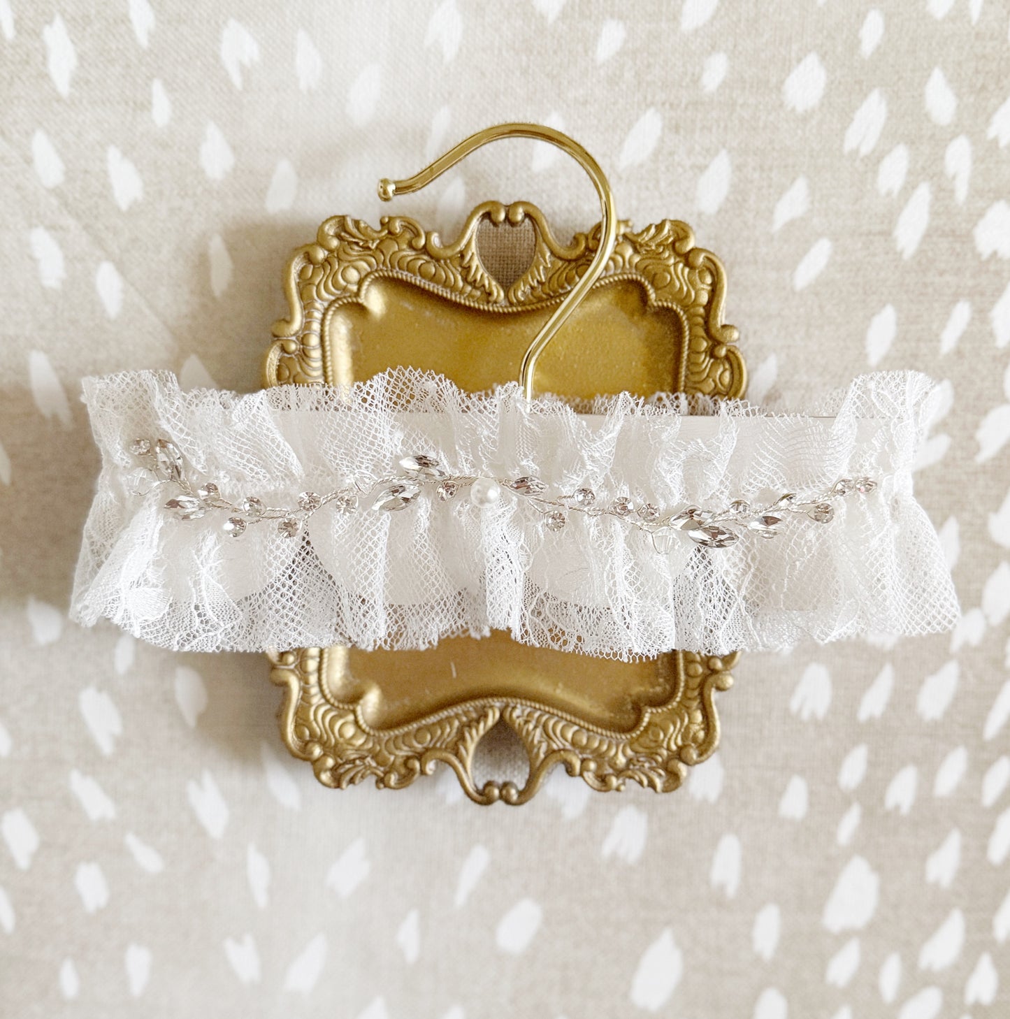 luxury lace wedding garter with rhinestone and pearl detailing by big Rock bridal